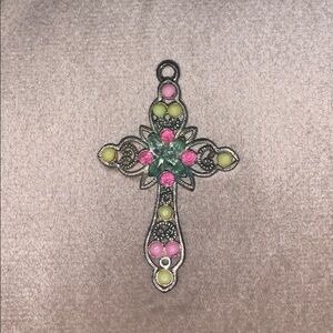 Silver cross pendant with pink & green stones